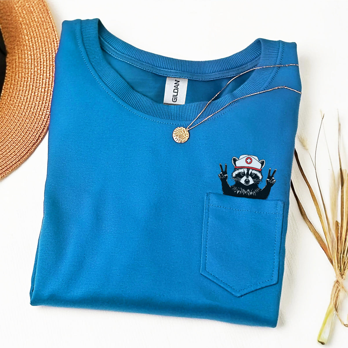 raccoon_nurse_pocket_sapphire_blue Raccoon Nurse Pocket T-Shirt - Image 5