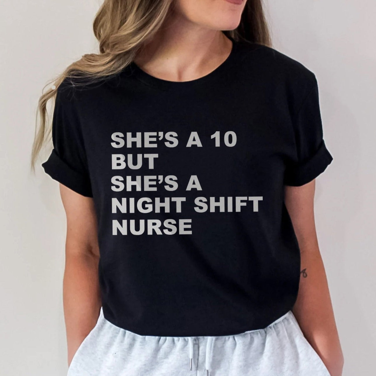 shesa10nurseblack She's a 10 but a Night Shift Nurse T-Shirt - Image 1